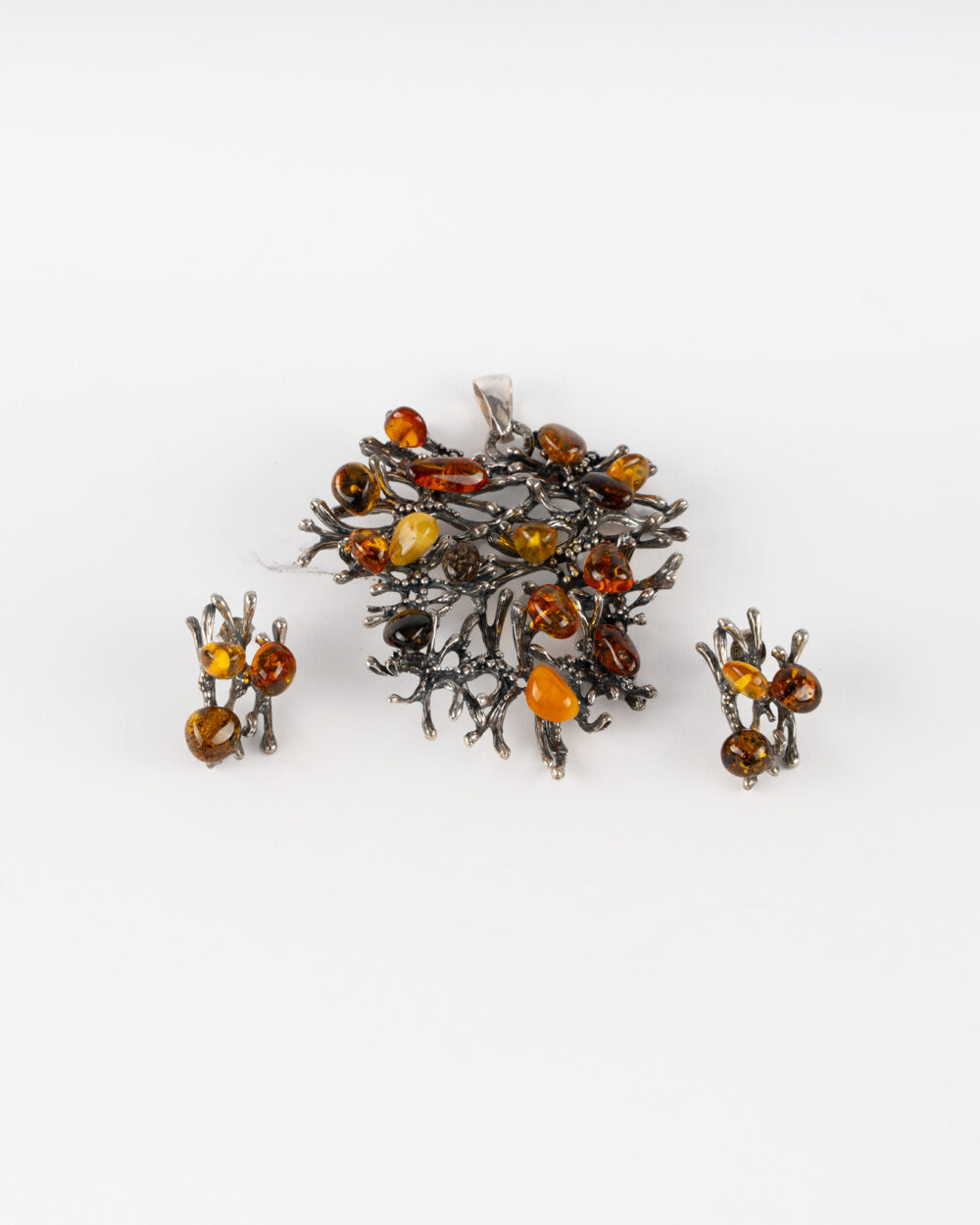Komplet artystycznej biżuterii srebrnej z bursztynami